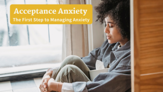 Young woman sitting in a corner, visibly experiencing anxiety, symbolizing the struggle and the journey towards acceptance and managing anxiety effectively.